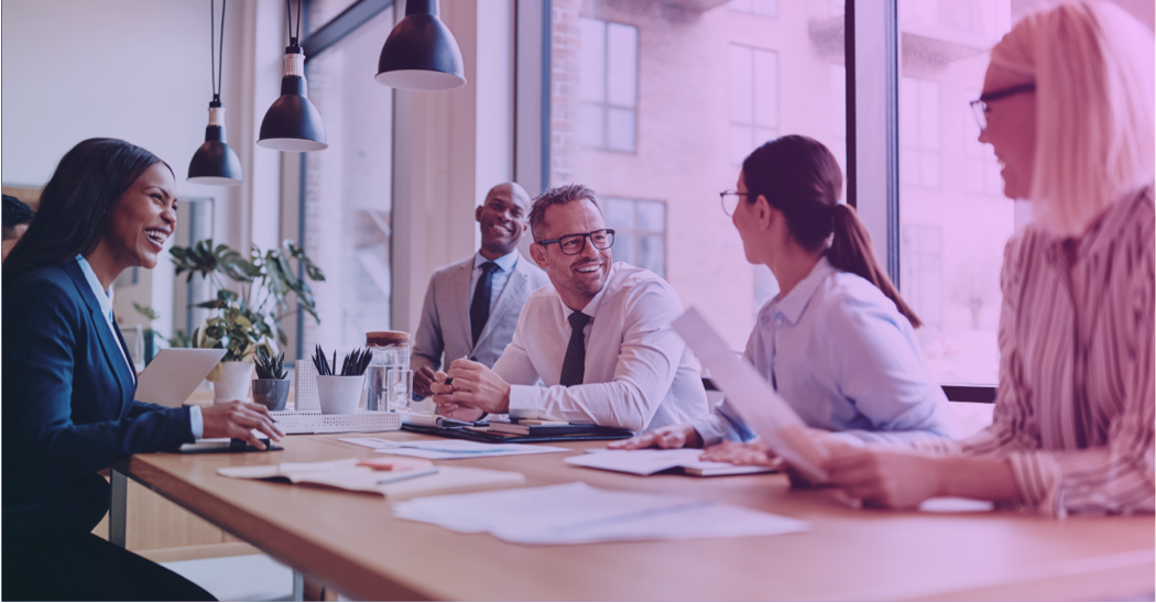 Smiling professionals in meeting