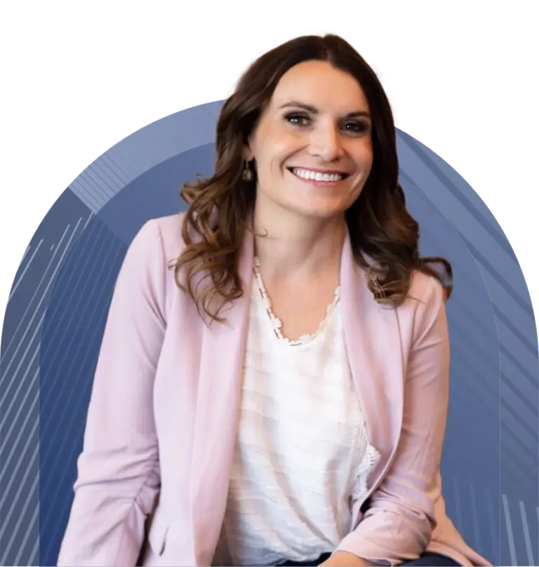 Professional headshot of a smiling woman with long dark hair wearing a pink cardigan and white top against a blue background.
